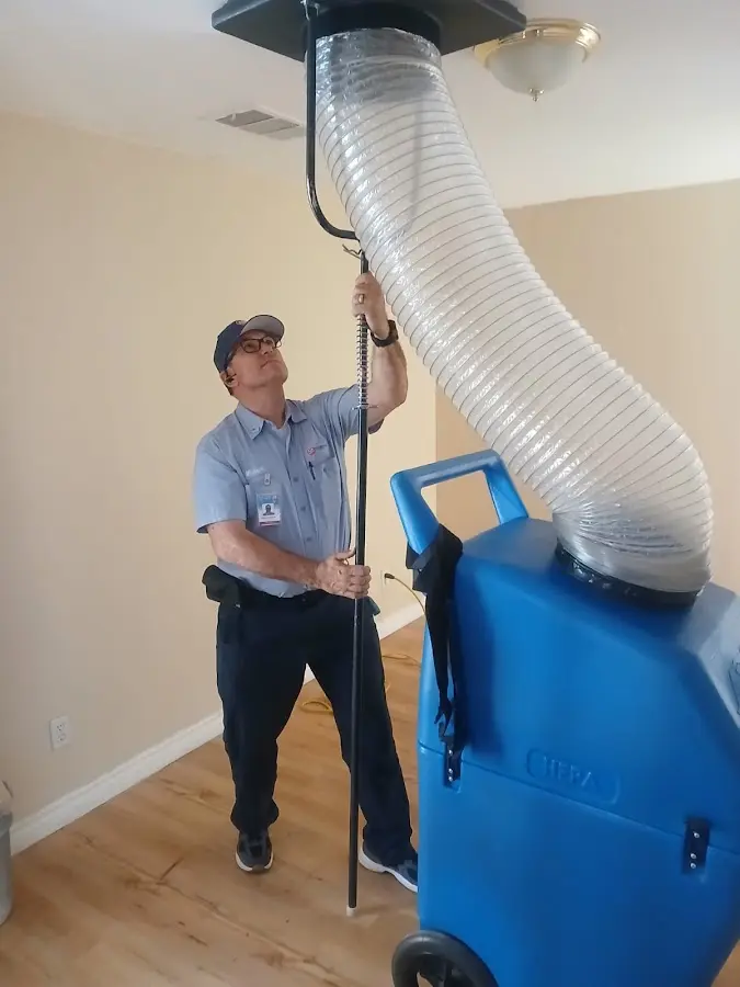 HVAC Installation technician using HEPA equipment in Destin